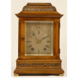 A late 19th Century German walnut 8 day bracket clock, the silvered dial with Roman numerals and