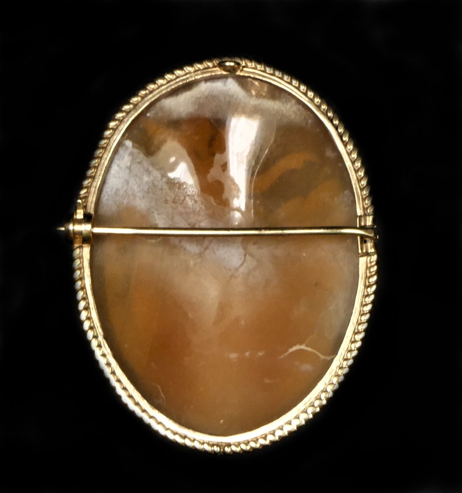 A gold mounted shell cameo, carved to depict Arion riding a dolphin, 43 x 33mm. This subject is - Image 2 of 2