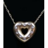 A 9ct gold openwork matt finish heart pendant, inset with ten diamonds, 15 x 14mm, chain, 3.1gm