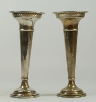 A silver pair of tapering vases, by Walker & Hall, Sheffield 1921, with pierced rim and gadrooned