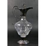 A silver and cut glass claret jug, Sheffield 2003, of vase shape with ornate finial, 33.5cm
