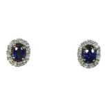 A pair of 9ct gold sapphire and diamond cluster ear rings, 8 x 6mm, 1.5gm