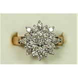 A 9ct gold and brilliant cut diamond cluster ring, stated weight 1.00ct, L, 4.9gm