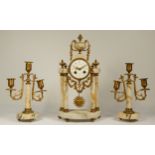 Japy Freres et Cie, Paris, a late 19th century French clock garniture, with columns, sunburst