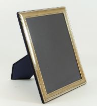 A silver photograph frame, Sheffield 2012, with bead border, 29 x 24cm