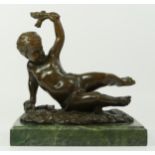 After Faguie, a 20th Century French bronze figurine in the form of a cherub putti, modelled