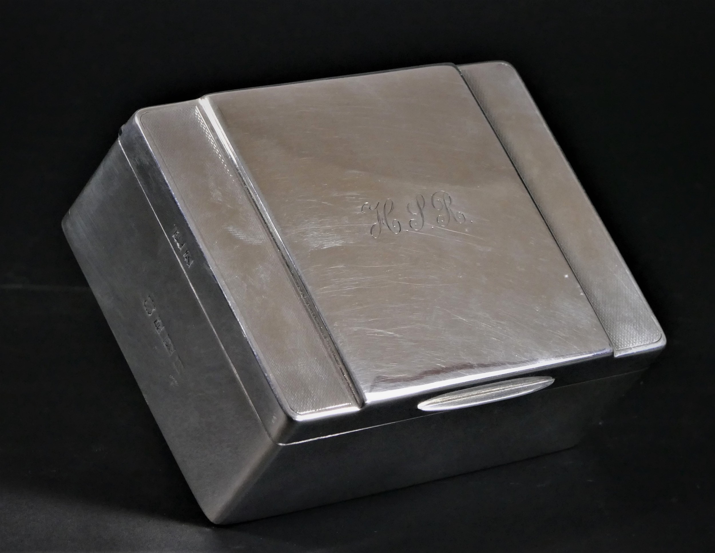 A silver cigarette box, Birmingham 1959, with stepped cover, initialed, 11.5 x 8.5 x 4cm