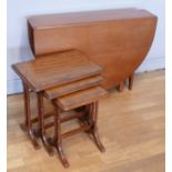 A 1970s teak gateleg drop-leaf dining table. L175cm, W107cm extended, together with a mahogany