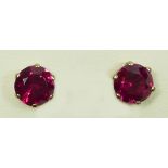 A 9ct gold pair of synthetic ruby ear studs, 2.3gm