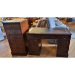 A mahogany twin pedestal desk with inset leather skiver, together with a matching three drawer filin