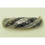 A 9ct white gold black and white diamond dress ring, stated weight 0.15cts, O, 2.3gm