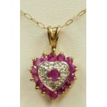 A 9ct gold ruby and diamond heart shape pendant, chain, 1.2gm
