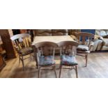 A pitch pine breakfast table with single frieze end drawer, raised on turned baluster legs