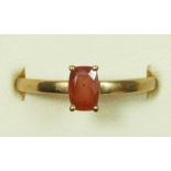 A 9ct gold single stone orange gemstone ring, N, 1.5gm