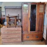 An Edwardian oak mirror door wardrobe with leaded glass side panels over a single drawer, 98 x 42