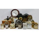 A collection of 20th century and later clocks, to include wall clocks, alarm clocks and carriage