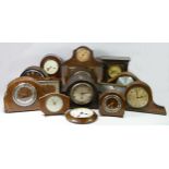 A collection of mid 20th century and later clocks in four boxes, to include oak cased Westminster