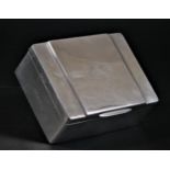 A silver cigarette box, Birmingham 1959, with stepped cover, initialed, 11.5 x 8.5 x 4cm