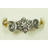 A 10K white gold and brilliant cut diamond cluster ring, N 1/2, 3.3gm