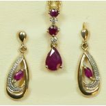 A 9ct gold ruby and diamond set pendant with matching ear rings, 5gm