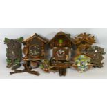 Seven mid 20th century Black Forest cuckoo clocks and chalet style wall clocks, spares or repair. (