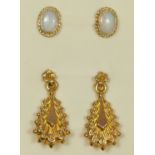 An Edwardian 9ct gold pair of ear pendants and a 9ct gold pair of opal ear studs, 2.2gm
