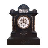 A Victorian black slate mantel clock, with etched floral decoration, white enamel dial with Roman