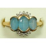 A 9ct gold blue topaz and diamond three stone ring, N, 2.7gm