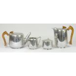 A four piece Picquot ware tea set, polished aluminium, c1950s, together with Four wristwatches, to