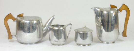 A four piece Picquot ware tea set, polished aluminium, c1950s, together with Four wristwatches, to