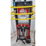 A Mac Tools professional coil spring compressor, c.2018, for sale due to closure of business