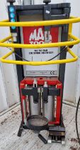 A Mac Tools professional coil spring compressor, c.2018, for sale due to closure of business