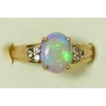 A 9K gold opal and brilliant cut diamond ring, N, 2.3gm
