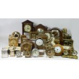 A collection of mid 20th century & later mantel clocks, together with a selection of travel alarm