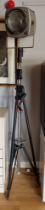 A Strand Electric, photographic studio lamp on collapsible tripod stand.