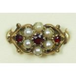 A Victorian style 9ct gold garnet and pearl cluster ring, Birmingham 1970, L, 2.5gm