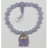 A lavender jade bead expanding bracelet with elephant charm, bead 8mm