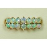 A 9ct two row opal ring, N 1/2, 2.4gm