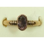 An unmarked 14ct gold pink stone ring, O 1/2, 2.1gm