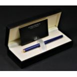 A Dunhill Gemline blue marble lacquer fountain pen, with 14K gold nib, box and booklet No Box