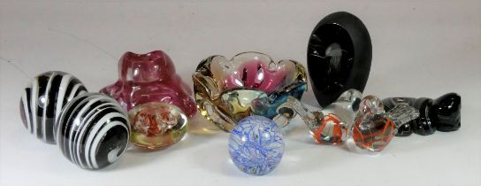 Seven unsigned paperweights, two in the form of birds, together with three pieces of art glass,