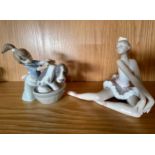 Lladro seated ballerina, 14cm together with Lladro girl washing her dog, 12cm. (2)