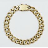 A 9ct gold flattened curb link bracelet, 49.1gm
