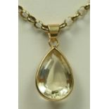 A gold mounted pear shape citrine pendant, 20 x 15mm, to a 9ct gold belcher chain, chain 10gm