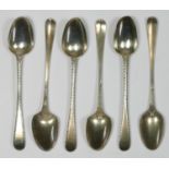 A George III silver set of feather edge bottom marked tea spoons, by William Fern, maker and lion