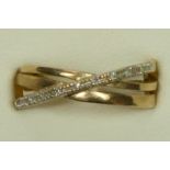 A 9ct gold and diamond crossover ring, N, 1.9gm