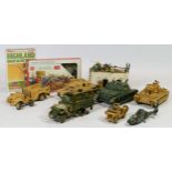 A collection of die-cast vehicles and figures (mostly military themed), including makes such as