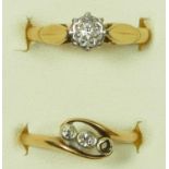 An 18ct gold brilliant cut diamond set single stone ring, M and an 18ct gold three stone diamond