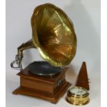 A reproduction His Masters Voice gramophone, together with a metronome and a Talamex ships bulk head