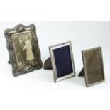 A silver photograph frame, Sheffield 1995, with embossed border and inscribed, 20.5 x 15cm, a